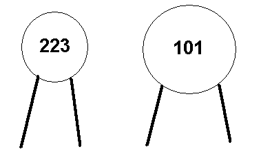 Figura 4 - Capacitores con valores dados por el código de 3 dígitos.

